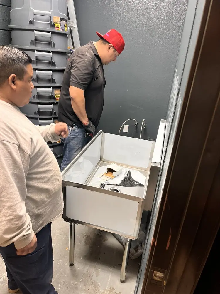 Commercial plumbing and sink installation in Sayers